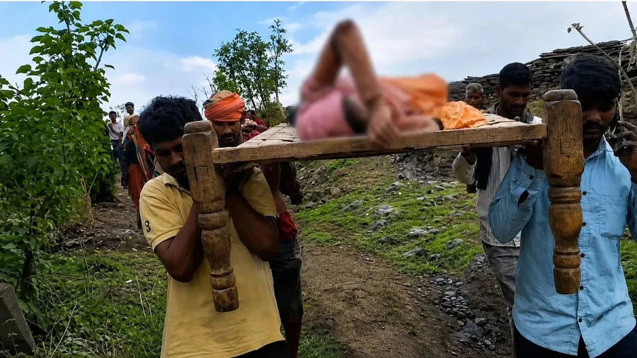 Woman gives birth while being carried across river on cot in MP village
