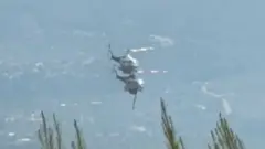 Two crew killed as British pilot survives after firefighting helicopters collide in Greece