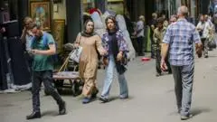 Iran says it is 'fully prepared' to counter widened US economic sanctions