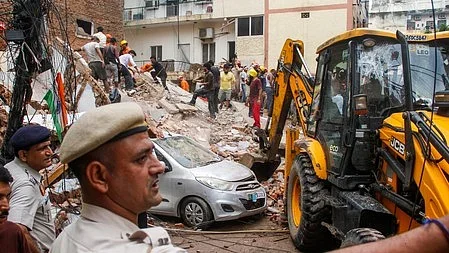 Delhi Police deploys 10 teams to trace owner of collapsed Satya Niketan building