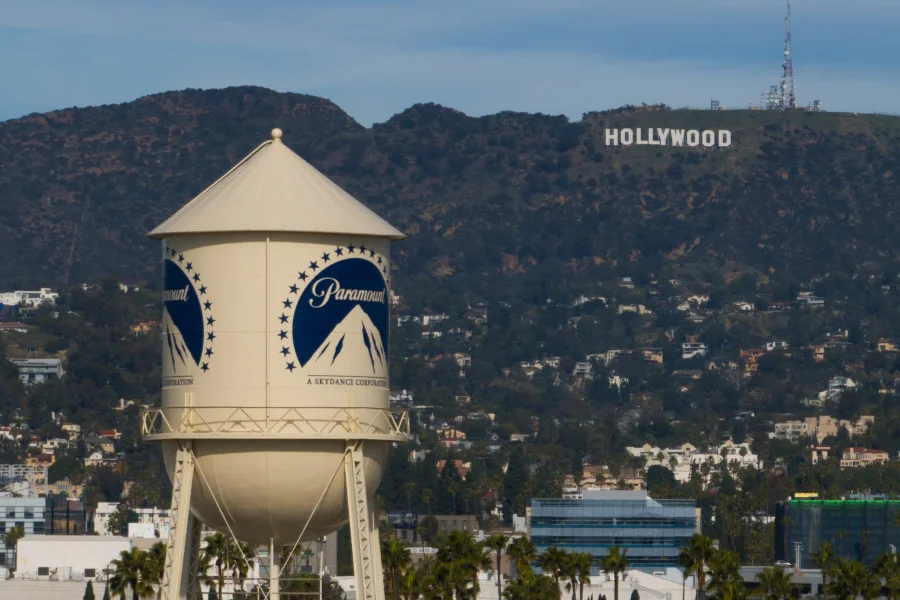 Paramount agrees invest $1.5 billion in domestic movies and create a board for editorial independence at CNN, CBS as part of deal for Warner Bros.