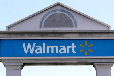 Walmart CEO says that the retail giant and its AI shopping assistant aren’t using personal information to set prices amid rollout of digital labels